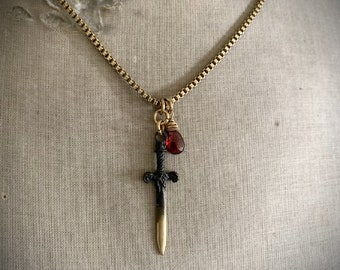 PROTECTED II - Gold Sword Necklace, Garnet Stone, Brass Chain, Gold and Black, Dagger, Religious, Cross Sword, Gold Chain, Edgy, ViaLove