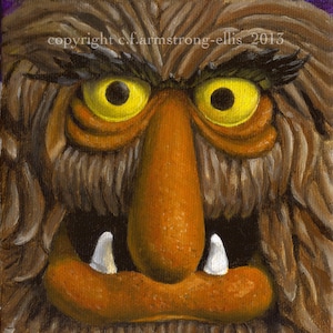 May include: A close-up of a brown, furry creature with yellow eyes and a large orange nose. The creature has a wide mouth with white teeth and a furrowed brow. The creature's fur is textured and appears to be made of paint.