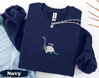 Moletom com bordado de dinossauro FNP, presente fofo para enfermeira(o) de prática avançada, suéter de agradecimento à enfermagem, moletom para estudante de enfermagem de prática avançada, camiseta de formatura de doutorado em enfermagem.