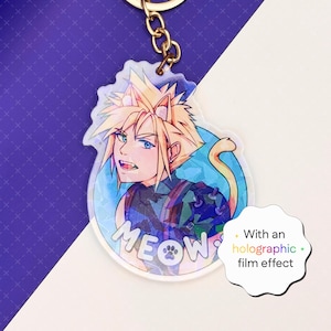 Könnte beinhalten: Ein transparenter Acryl-Schlüsselanhänger mit einer Cartoon-Illustration einer Figur mit blonden Haaren und Katzenohren. Die Figur trägt ein blaues und schwarzes Outfit und hat einen gelben Schwanz. Der Schlüsselanhänger hat das Wort "MEOW" mit einem Pfotenabdruck darauf gedruckt. Der Schlüsselanhänger hat einen holografischen Filmeffekt.