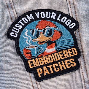 May include: Embroidered patch featuring a cartoon duck wearing sunglasses and holding a coffee cup. The patch has the text "CUSTOM YOUR LOGO" and "EMBROIDERED PATCHES" in white and orange.