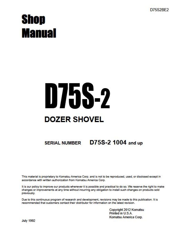 May include: A white shop manual with black text. The title "Shop Manual" is at the top, followed by "D75S-2 DOZER SHOVEL." The serial number is D75S-2 1004 and up. Copyright 2012 Komatsu, printed in U.S.A.