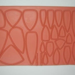 Triangle Shields  Unmounted Rubber Stamp for Crafts in Polymer, Metal and Ceramic Clay by Barbara McGuire