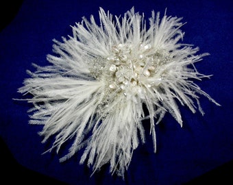 Ostrich feather fascinator with moonstone. freshwater pearl and sterling silver