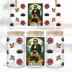 May include: Glass tumblers with bamboo lids and straws. The design features a man in a suit on a toilet, with the text "EL PADRINO". The tumblers are decorated with red roses, black succulents, and green and red accents.