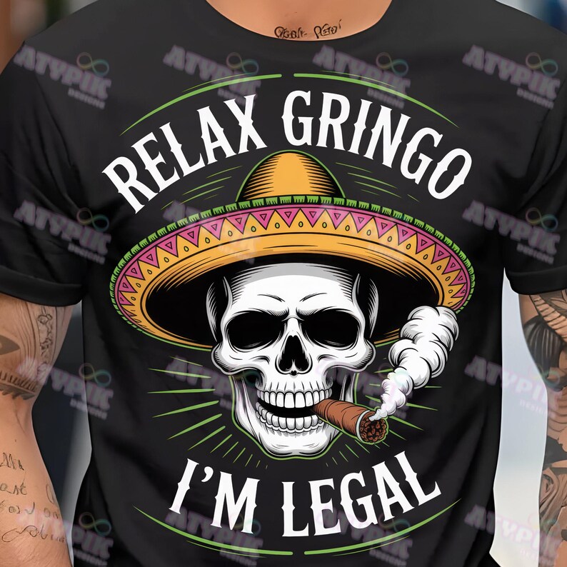 May include: Black t-shirt with a graphic of a skull wearing a sombrero and smoking a cigar. The text "RELAX GRINGO I'M LEGAL" is printed above and below the skull in white.