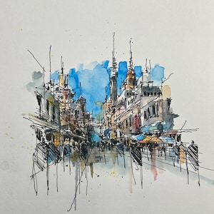 May include: Watercolour and ink illustration of a European city street scene. The artwork features buildings with detailed architectural elements, a blue sky, and figures of people walking along the street. The style is loose and expressive.