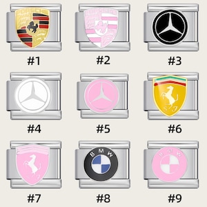 May include: Nine silver-toned charm bracelets with various car brand logos. The logos include Porsche, Mercedes-Benz, Ferrari, and BMW, in colors like black, white, pink, yellow, and red. Each charm is labeled with a number.