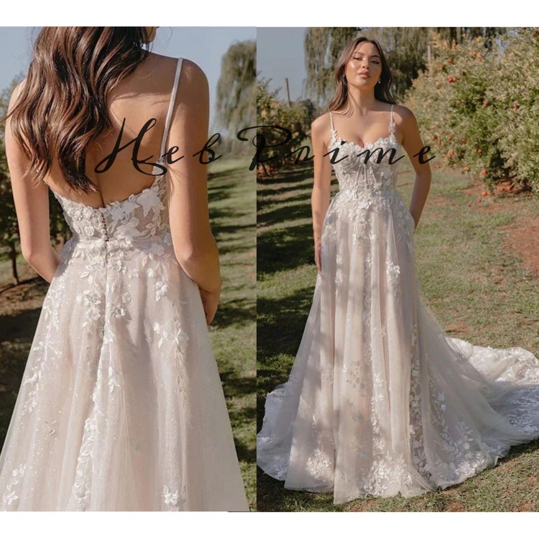 Elegant Backless Wedding Dresses with Spaghetti Straps for Timeless Spice