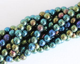 Cuentas redondas de cristal checo de 0.157 in, color azul metálico, verde, morado, iris