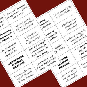 May include: Two white rectangular cards featuring black printed text arranged in a grid of affirmations. The text includes phrases such as I serve my community with honour, bravery, and dedication, I trust my training, my instincts, and my team.
