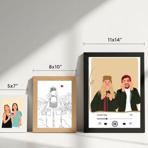 May include: Three framed art prints of different sizes. The smallest is 5x7 inches, the middle is 8x10 inches, and the largest is 11x14 inches. The prints feature illustrations of people, with one including the text "I Love You".