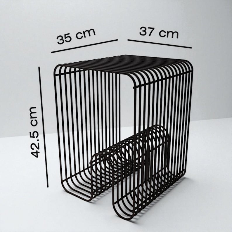 May include: Black metal stool with a rectangular seat and a unique, curved base. The stool measures 35 cm x 37 cm (13.8 x 14.6 inches) at the top and is 42.5 cm (16.7 inches) tall. The design features vertical bars for the sides and seat.