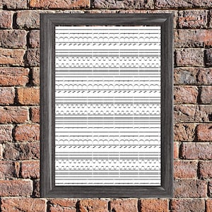 May include: A framed artwork with a black and white abstract design. The artwork features horizontal lines and curved shapes. The frame is a dark gray color. The artwork is displayed against a brick wall.