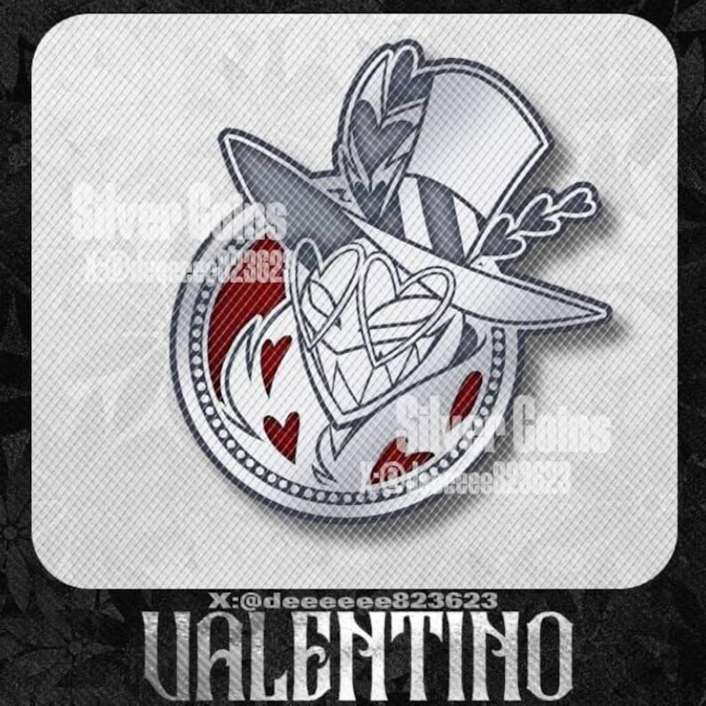 May include: A silver-colored Valentino pin with a detailed design. The pin features a top hat, hearts, and the word "VALENTINO" at the bottom. The design is set against a textured gray background with the text "Silver Coins @deeeeeee823623".