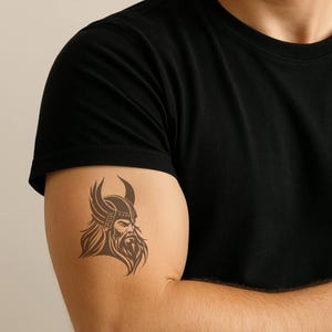Viking Warrior Temporary Tattoo – Norse Helmet Design in Eco Ink | Buy More, Save More – Bold, Mythical & Easy to Apply