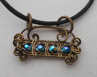 Horizontal Woven Wire Bar Pendant, Reversible Faceted Rainbow and Black Beads, Golden and Antiqued Brass Wire Wrapped Necklace