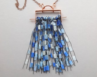 The Alphabet Skirt -- Copper and Fiber Necklace, Blue, White Ladder Ribbon, Hammered Copper Wire, Stamped Letters on Copper Box, Mixed Media