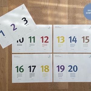 Op de afbeelding: Set met printbare nummerkaarten met de nummers 1 tot en met 20. Elke kaart heeft een andere kleur en een raster met stippen die het nummer voorstellen.