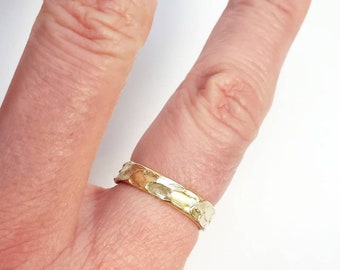 Unisex organic Wedding ring 4-5mm wide in solid yellow gold 10k 14k 18k custom engraved inside.