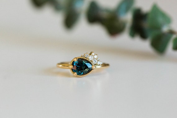Reserved for Etsy Design Awards Pear cut teal sapphire ring | Etsy
