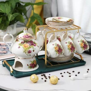 Ręcznie robiony ceramiczny zestaw do herbaty: kwiatowe filiżanki i spodki do kawy