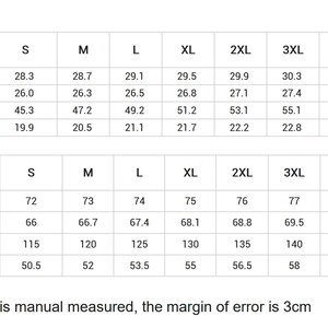May include: A size guide chart with measurements in inches and centimeters. The chart includes measurements for length, sleeve, bust, and shoulder, with sizes ranging from S to 5XL. The text at the bottom states the size chart is manually measured, with a 3cm margin of error.