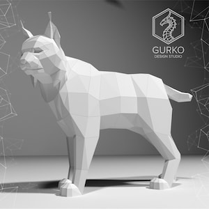 Op de afbeelding: Een wit, low-poly 3D-model van een lynx, gerenderd in een eenvoudige, minimalistische stijl. Het model staat met zijn hoofd lichtjes gedraaid.