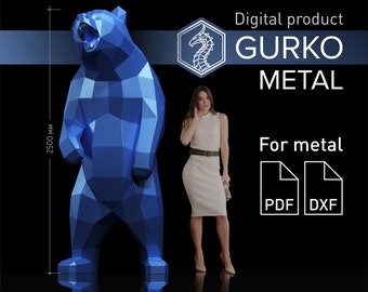 May include: Digital product GURKO METAL for metal.  A blue polygonal bear sculpture stands on a reflective surface.  The bear is 2500 mm tall.  The product is available in PDF and DXF formats.