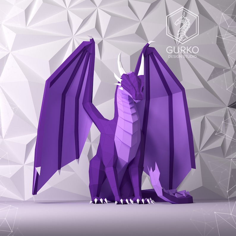 May include: Purple origami dragon with white claws and horns. The dragon is sitting with its wings spread out. The background is a white geometric pattern.