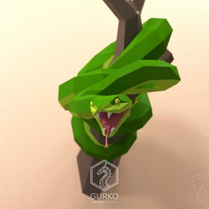 May include: A green snake with a yellow eye and an open mouth, wrapped around a brown branch. The snake is made of paper and has a low-poly style.