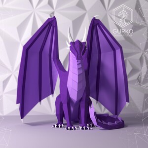 May include: Purple origami dragon with wings spread wide. The dragon is sitting on a white surface with a geometric pattern.