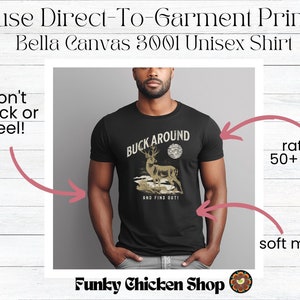May include: Black t-shirt with a vintage-style graphic of a deer with the text "Buck Around and Find Out!" printed on it. The shirt is made from a soft material and is rated for 50+ washes.