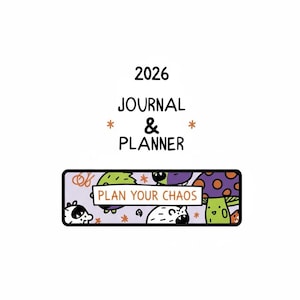 May include: A 2026 journal and planner with the text "Plan Your Chaos." The cover features a colourful design with cartoon illustrations of creatures, mushrooms, and stars. The background is white.