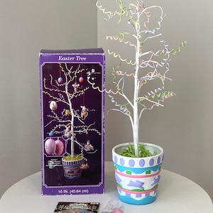 May include: A rustic wooden sign with the text "Welcome to our home" in white lettering. The sign features a distressed finish and a simple, inviting design, perfect for front door decor.