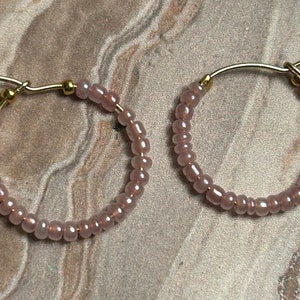 Pink beaded hoop earrings