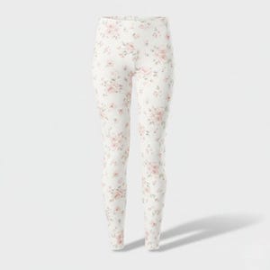 May include: Full-length leggings in a crisp white fabric featuring an all-over delicate floral pattern of soft pink roses and small green leaves. The garment has a high-rise waistband and a fitted silhouette that extends to the ankles.