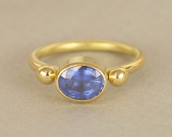 18ct Recycled Gold Oval Blue Sapphire Engagement Ring. Ancient Roman Style Gold Stud Ring