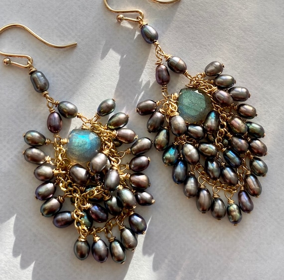 The Falcon Earrings in Peacock