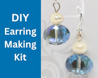 May include: DIY earring making kit with two pairs of earrings. Each earring has a blue crystal bead and a white pearl bead.