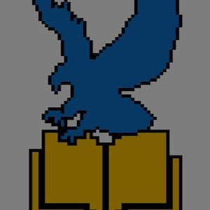 May include: A blue eagle perched on top of a gold book with a pointed bottom.