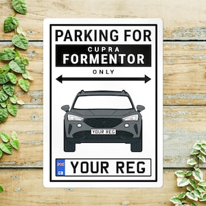May include: A rectangular sign with the text "PARKING FOR CUPRA FORMENTOR ONLY" above a gray car illustration. Below the car is a license plate that says "YOUR REG". The sign has a black and white design.