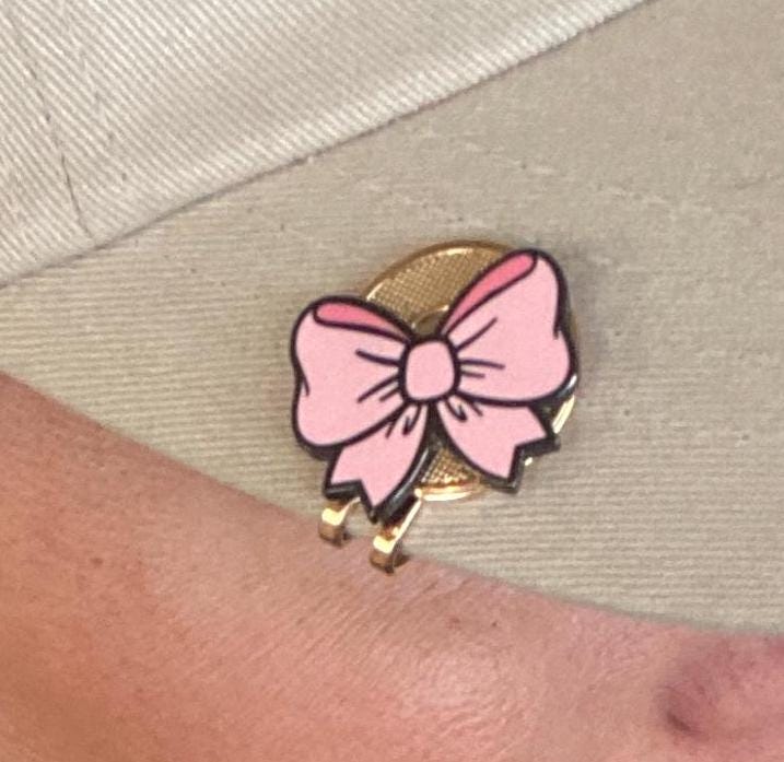 Pink bow golf ball marker