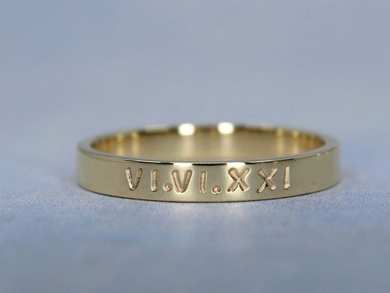 Personalized gold ring made to order in 10k or 14k gold. 3mm wide.