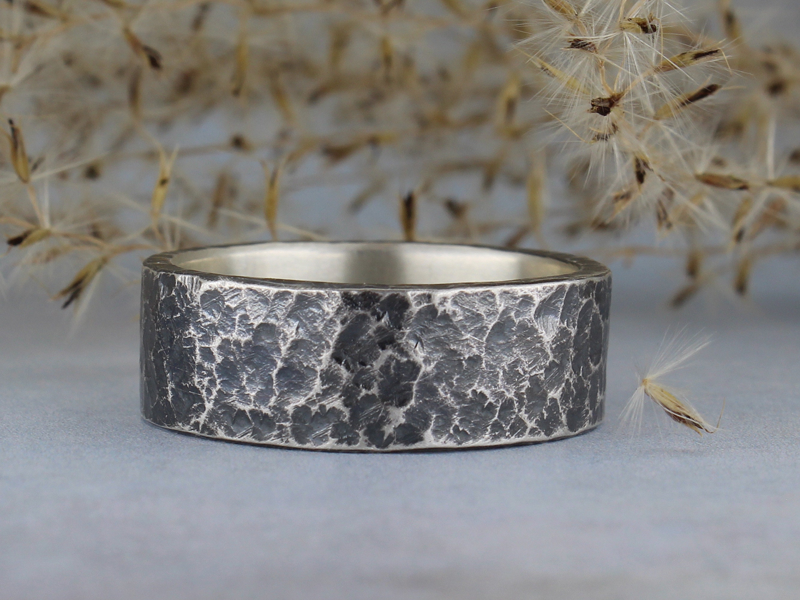 Upcycled rings made with soft solder on pure silver hammered bands