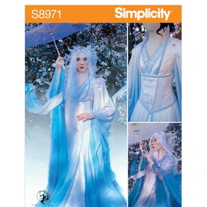 May include: Simplicity pattern S8971 features a long, flowing gown with a white bodice and gradient blue sleeves and skirt. The design includes a high collar, a structured waist panel, and sheer layered fabric. A matching blue parasol is included.