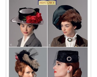 May include: Butterick B6397 sewing pattern for four distinct hats. View C features a wide brim with red flowers. View A is a large dark green hat with a brown feather. View D has black netting and feathers. View B is a black pillbox hat with netting.
