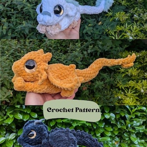 May include: Three plush dragon toys made of soft yarn, featuring large dark eyes and textured bodies. The top dragon is light blue and white, the middle is orange, and the bottom is dark blue. Text reads CraftedForComfort and Crochet Pattern.