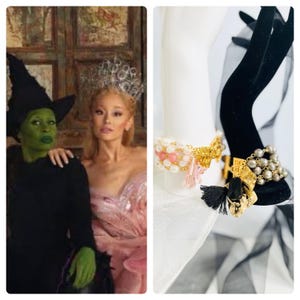 May include: Two women wearing costumes, one in a green witch costume and the other in a pink dress with a silver crown. The witch is holding the other woman's arm. The image also shows a close-up of a gold bracelet with pink and white beads and a black tassel.