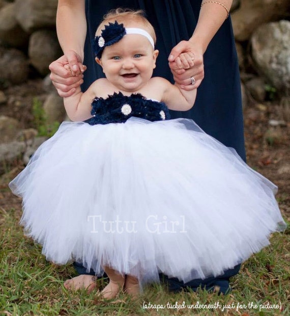 white dress with navy blue flowers